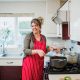 Mature Woman Enjoying Cooking at Home